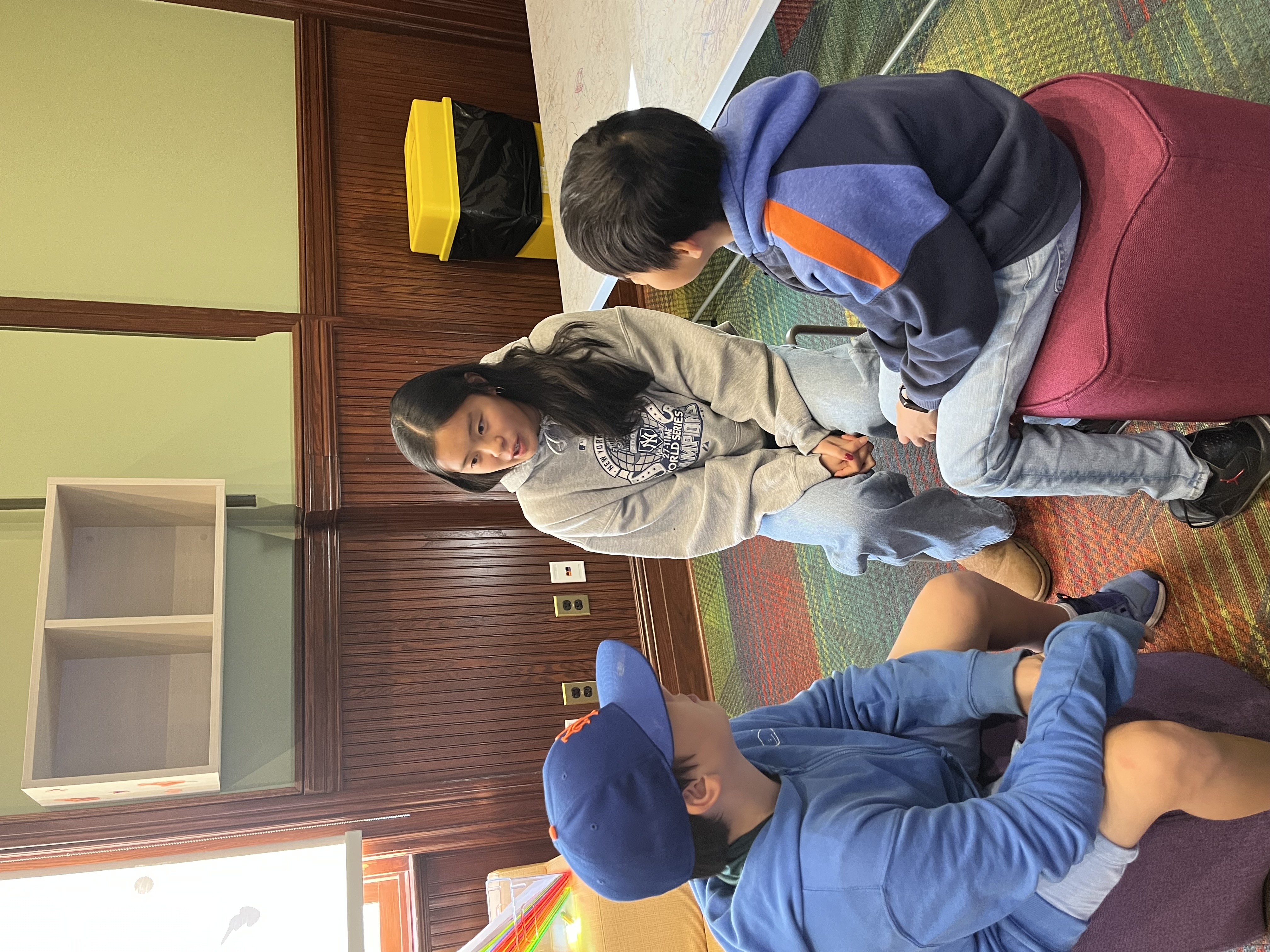 Project Coin workshop session with students in a library setting
